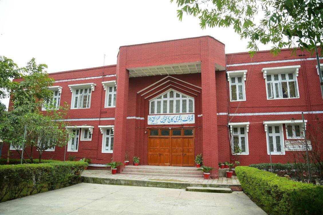 Happy School girl, reading a school book